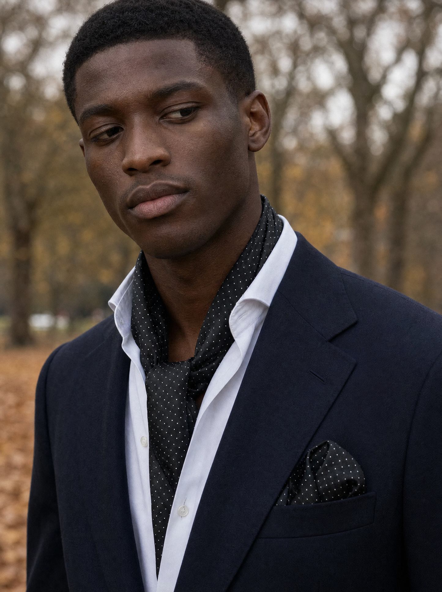 Black With White Polka Silk Scarf & Pocket Square Set worn by a model — men's scarf