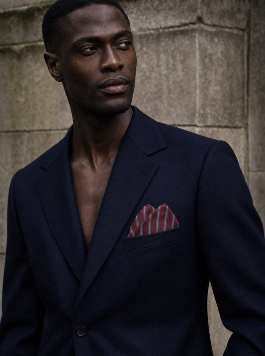 Regimental Maroon And Grey Silk Pocket Square folded in a suit breast pocket — men's silk pocket square